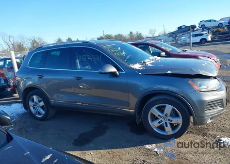 2012 Volkswagen Touareg Vr6 Lux z USA, uszkodzony, nr VIN WVGFF9BP0CD002184